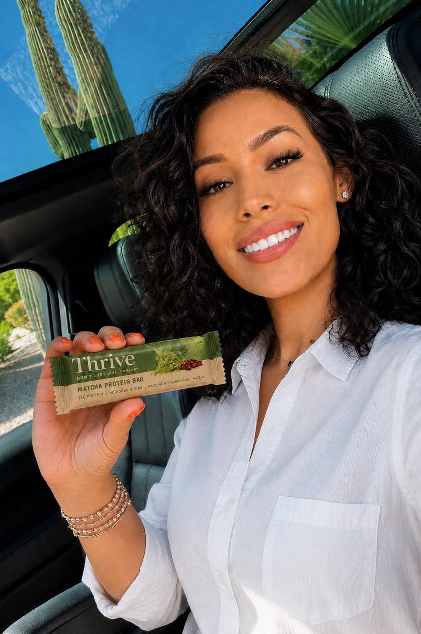 woman sitting in car holding thrive bar yamammi influencer marketing